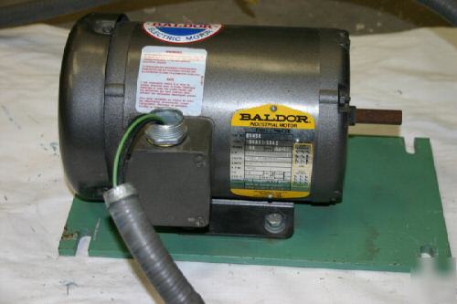 Baldor elec. motor .25 hp. with wire hose
