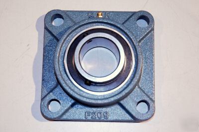 New power rite bearings- std. 4 bolt flange ucf-209-28 