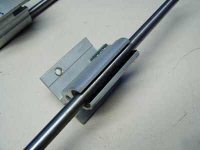 Thompson type rails & bearings w/ lockdown mechanism