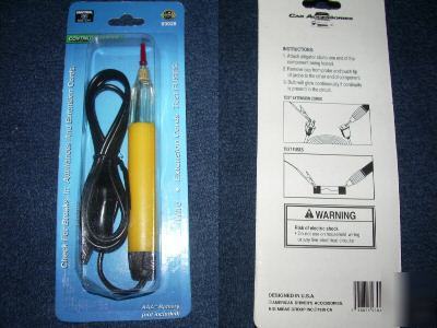 Battery powered continuity tester with clip and light
