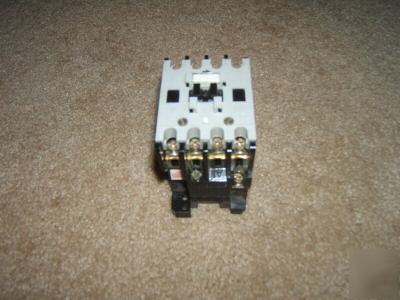 Allen-bradley [ 3 pole w/ 1 aux. contactor ] relay.