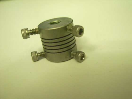 Helical flex coupler for stepper servo motor lead screw