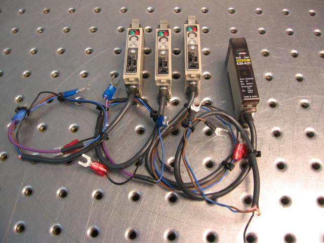 G34010 four omron E3X-A21 photoelectric sensors